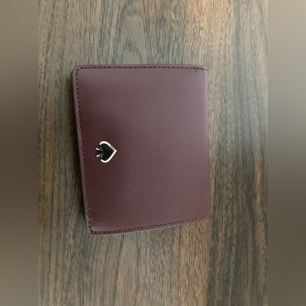 Kate Spade Nadine small bifold wallet leather maroon purple red card holder snap